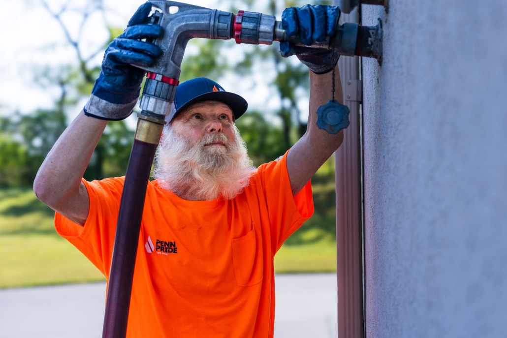 employee filling home with fuel