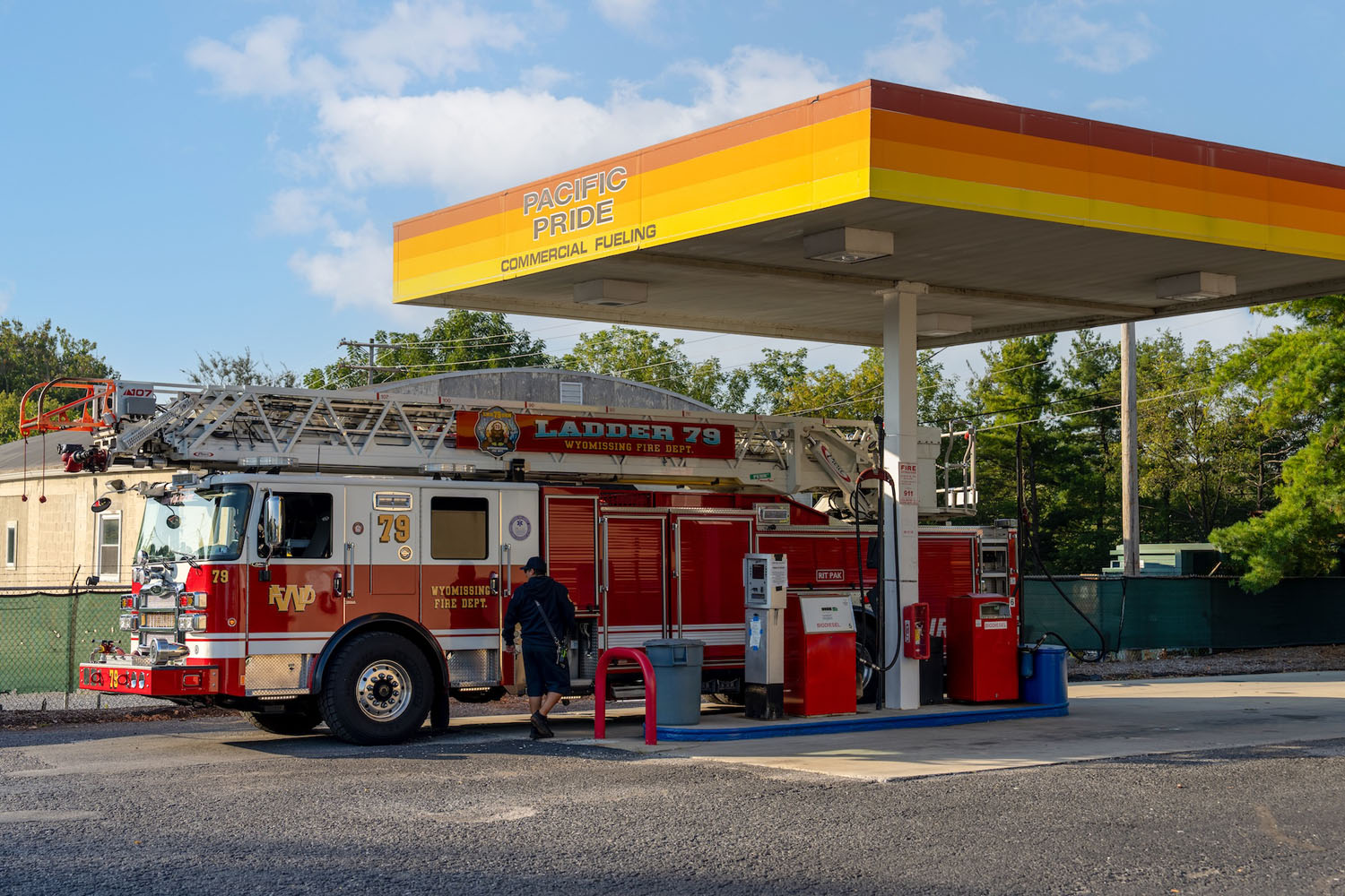 firetruck at a fueling station